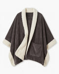The Reader's Wrap laid flat: charcoal grey fleece front, cream sherpa lining and border, deep front patch pocket